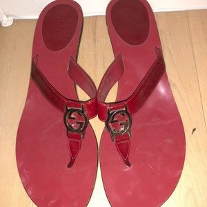 Red Gucci sandals with a little heel.